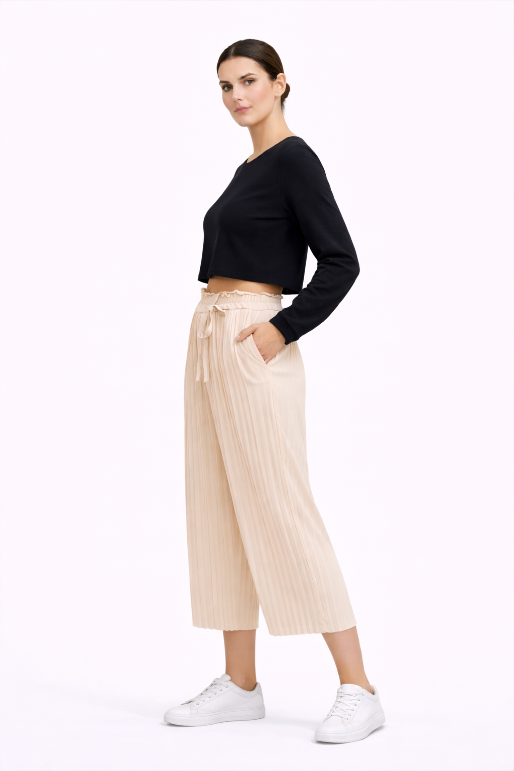 Mía | Pantalón beige de corte plisado