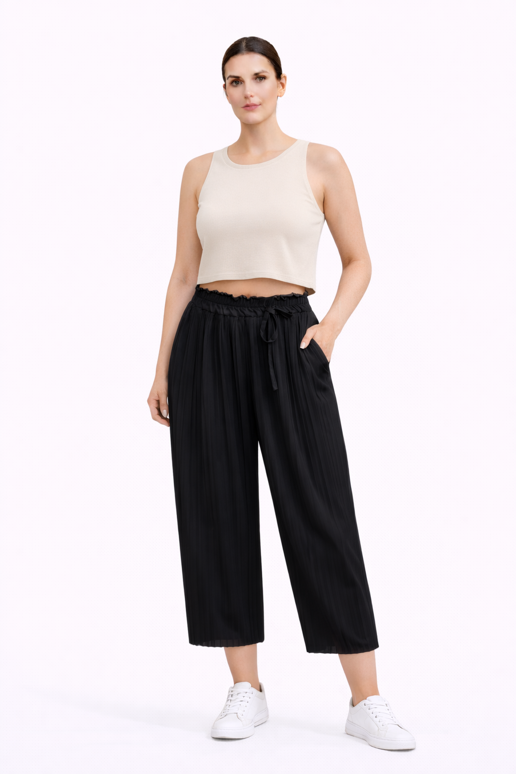 Mía | Pantalón beige de corte plisado