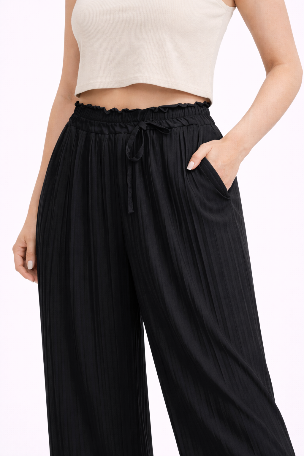 Mía | Pantalón beige de corte plisado
