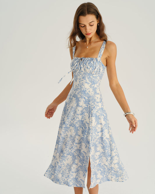 Luciana | Vestido midi azul con volantes y estampado floral