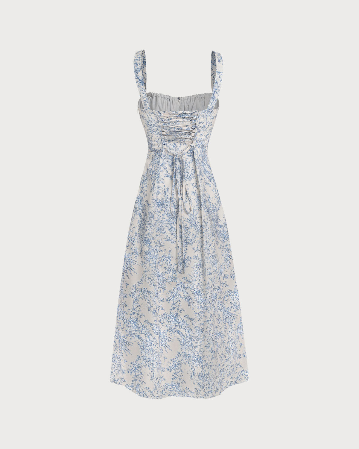 Luciana | Vestido midi azul con volantes y estampado floral