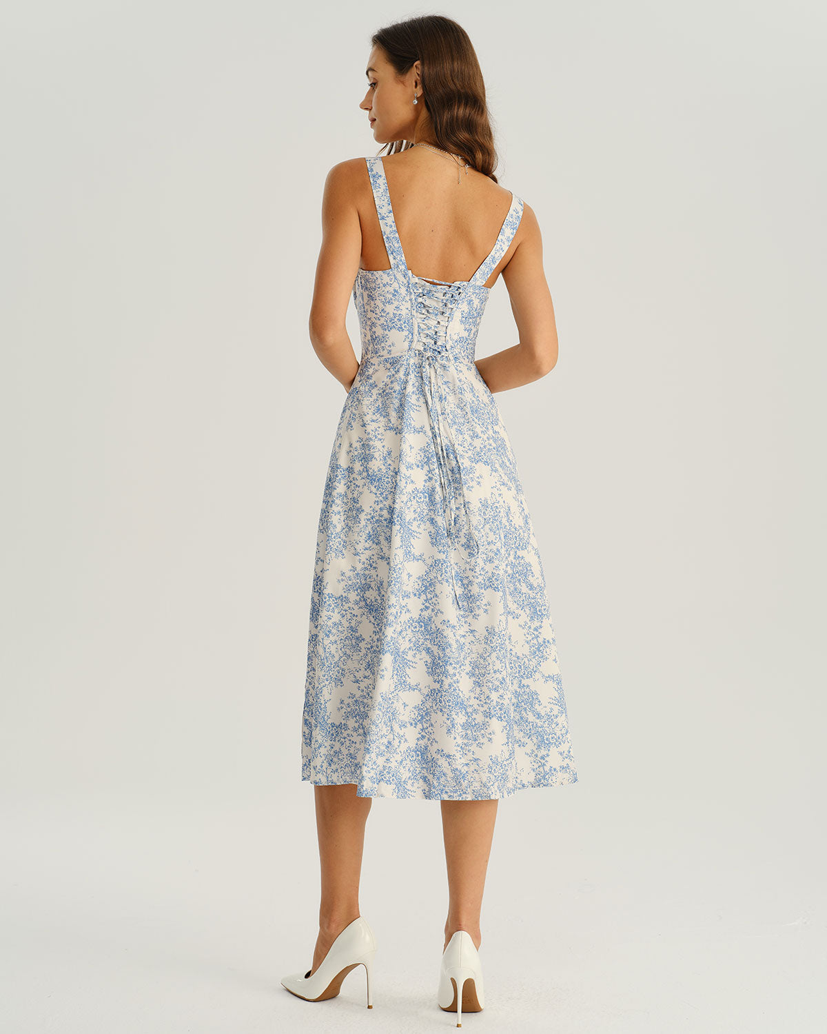 Luciana | Vestido midi azul con volantes y estampado floral